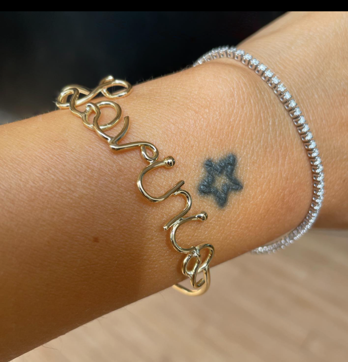 Bracciale in oro 18kt a filo con scritta