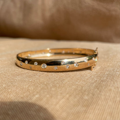 .mille. - bracciale rigido in oro 18kt con diamanti