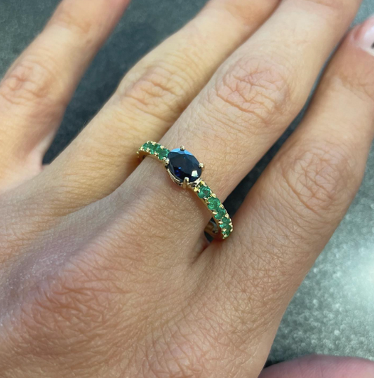 Pi - veretta di smeraldi con zaffiro centrale