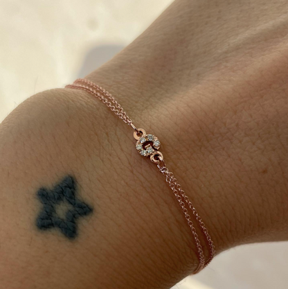 Bracciale con scritta o simbolo in oro 18kt e diamanti