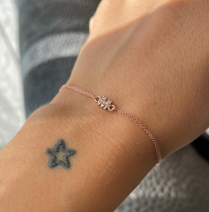 Bracciale con scritta o simbolo in oro 18kt e diamanti