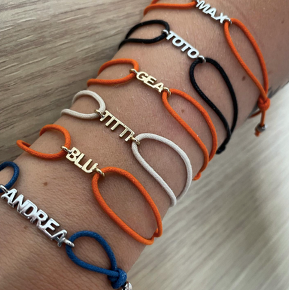 Nomi e cordino - bracciale in oro 18kt