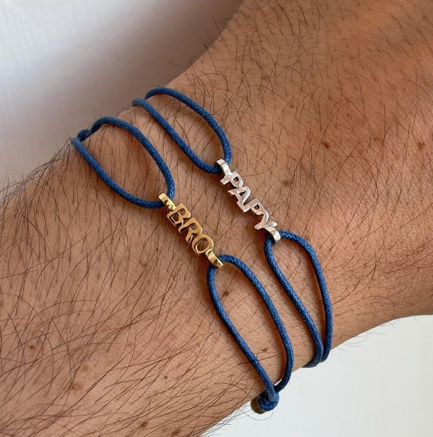 Nomi e cordino - bracciale in oro 18kt