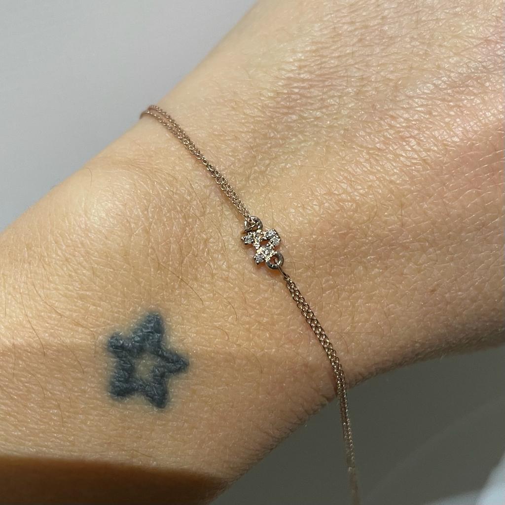 Bracciale con scritta o simbolo in oro 18kt e diamanti